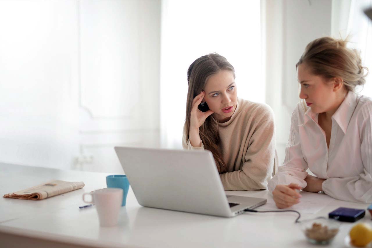 Account manager talking to an insured about some bad news