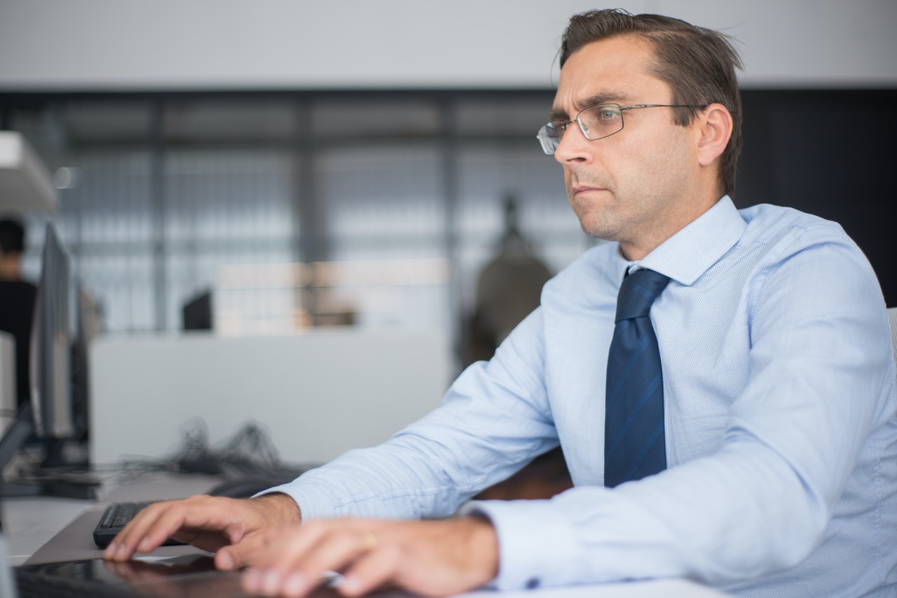 Insurance agent working on billing
