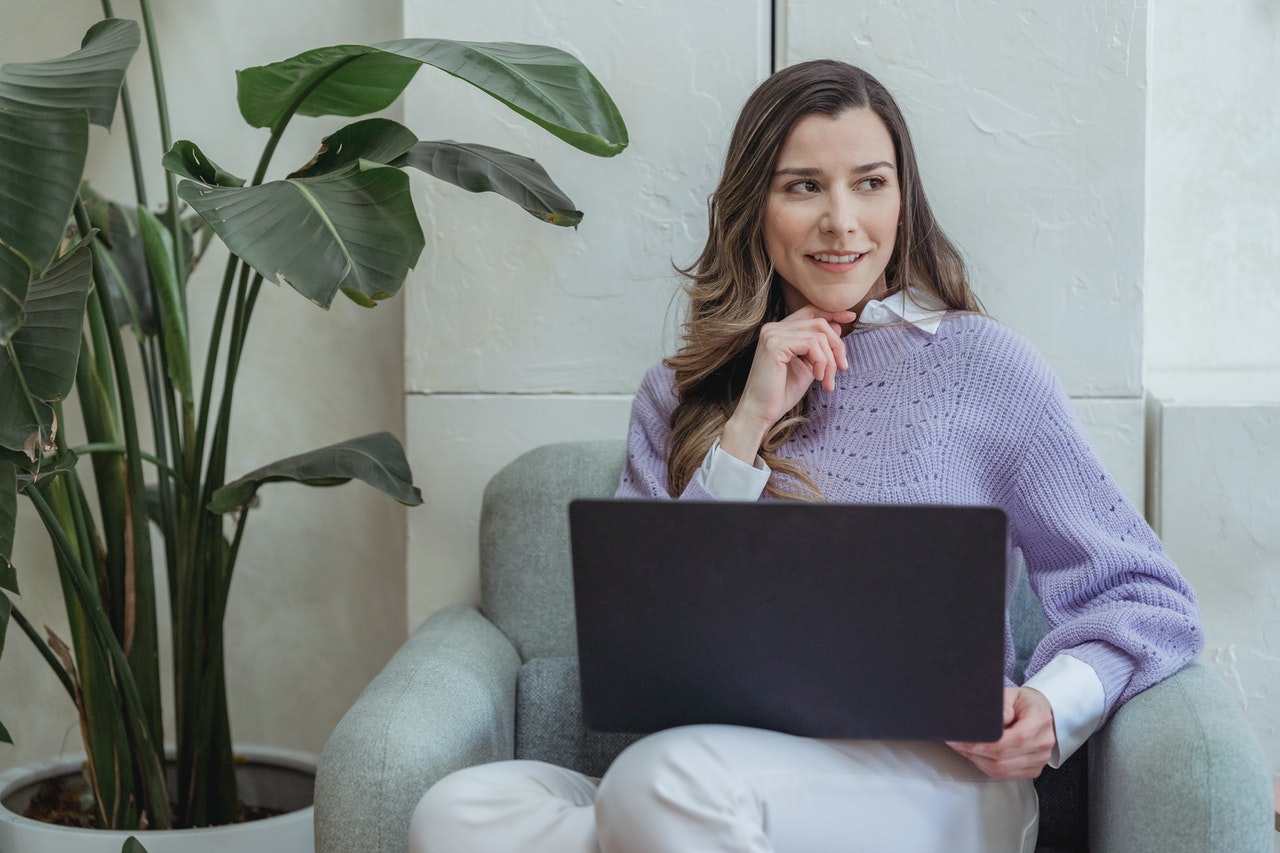 Woman working from home for insurance agency due to social distancing