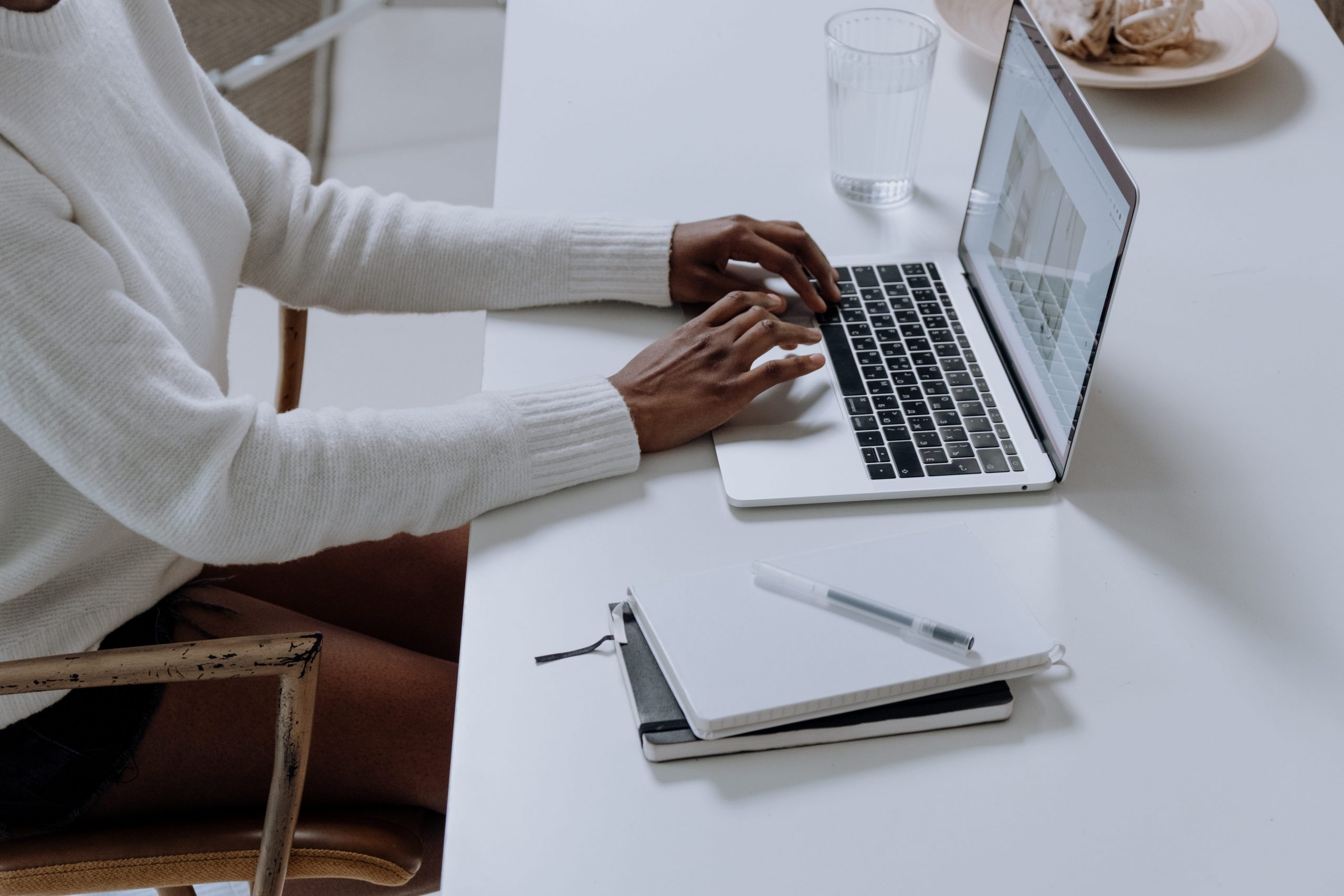 Manager evaluating the Sales process on a laptop computer