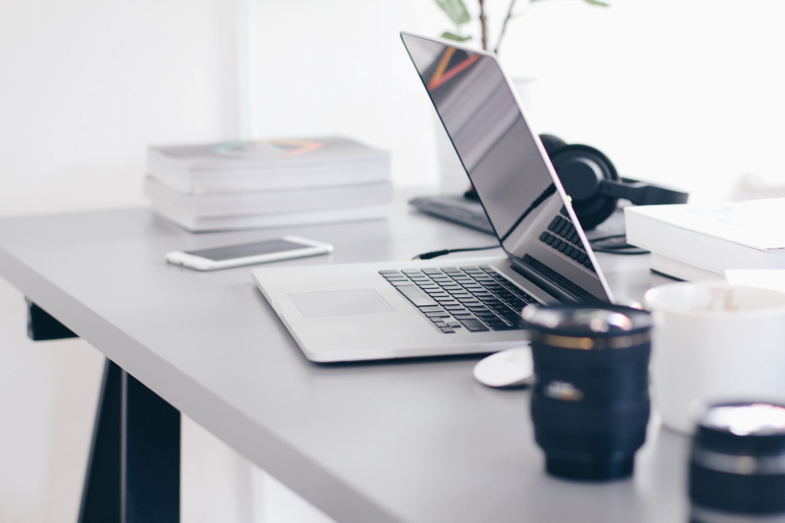 Laptop on desk with no worker present