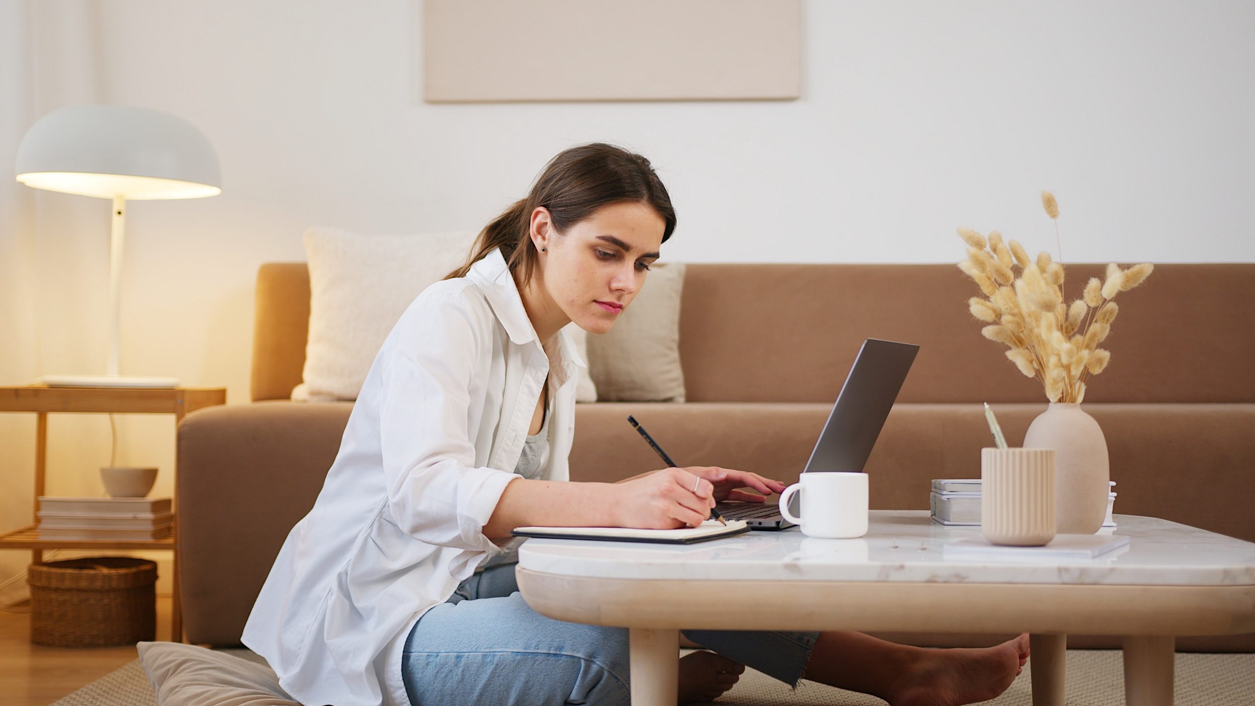 Woman working from home and training with Total CSR in her living room