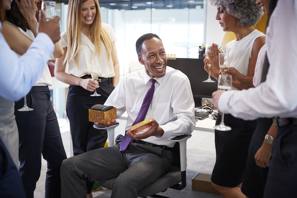 Coworkers Celebrating Insurance Producer or CSR Retirement